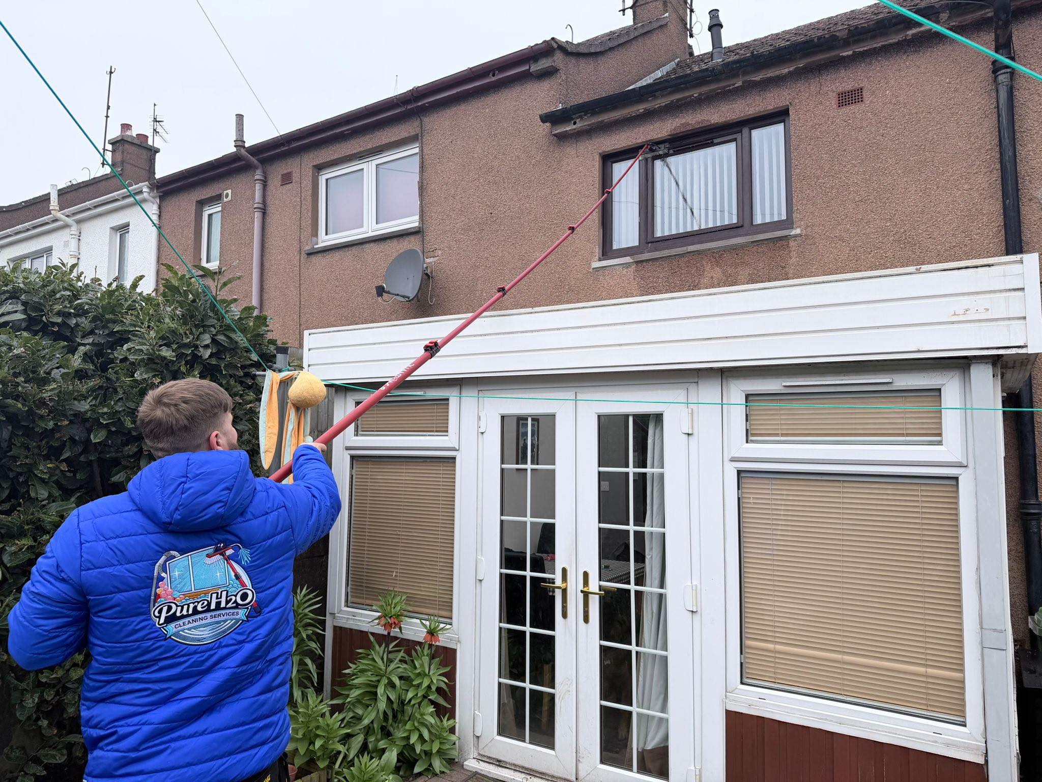 Pure H2O Cleaning Services LTD cleaning upper windows